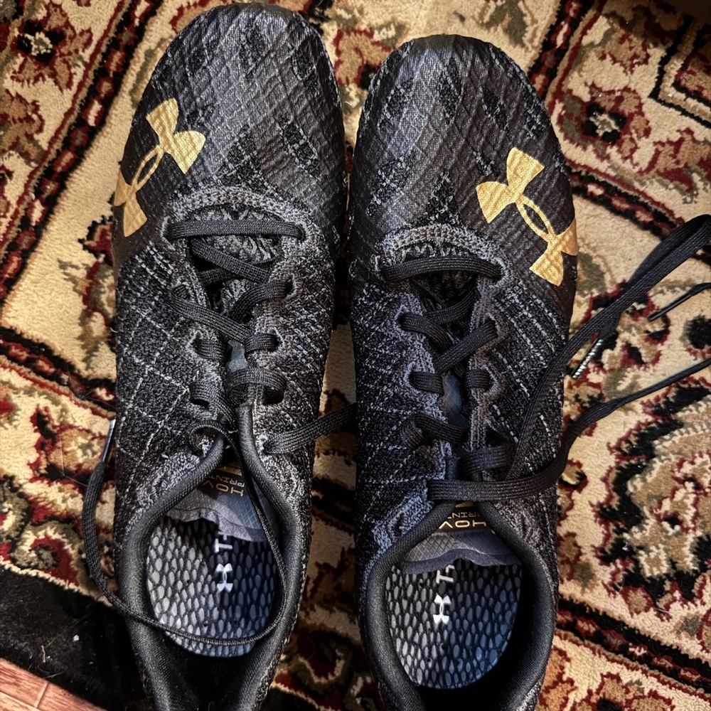 Under Armour women's Black and Gold Athletic Shoes